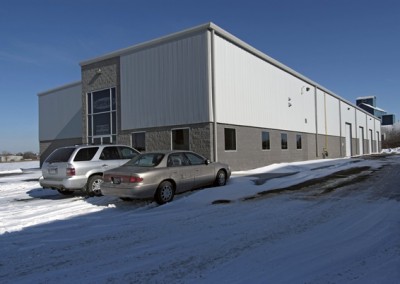 commercial steel building store front with multi bay doors