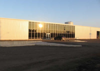 commercial metal building with glass wall