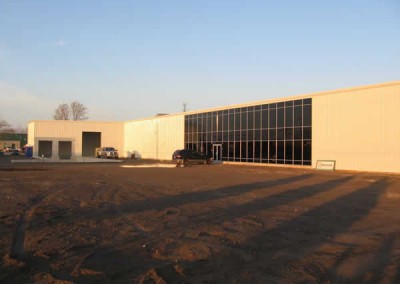 commercial metal building with glass wall side view