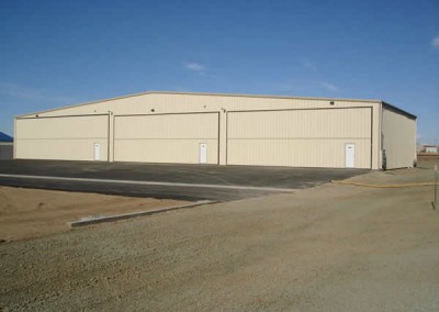 aircraft storage building with 3 man doors